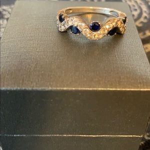 Blue and diamond Helzburg ring.